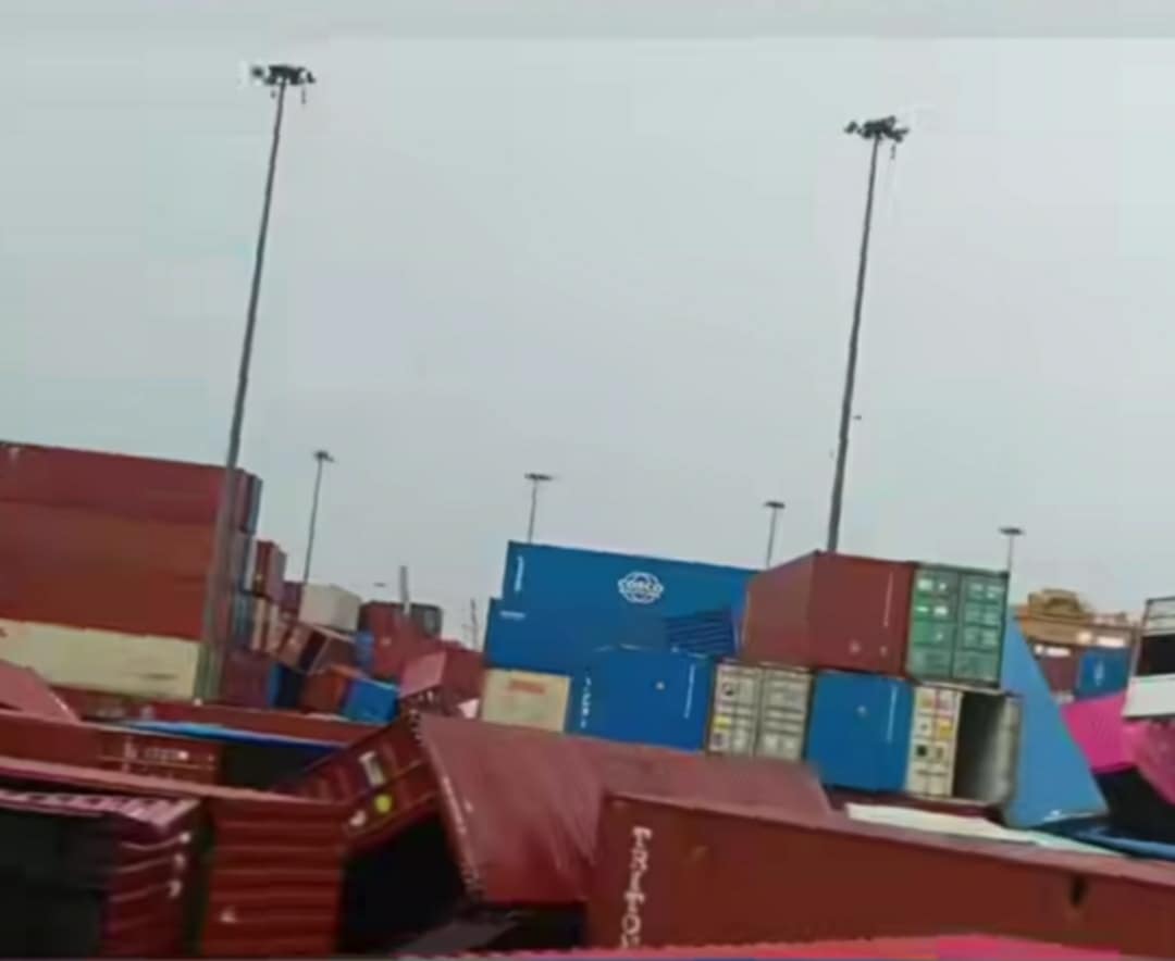 Strong winds damage containers in Botahtaung container yard and shops along the road