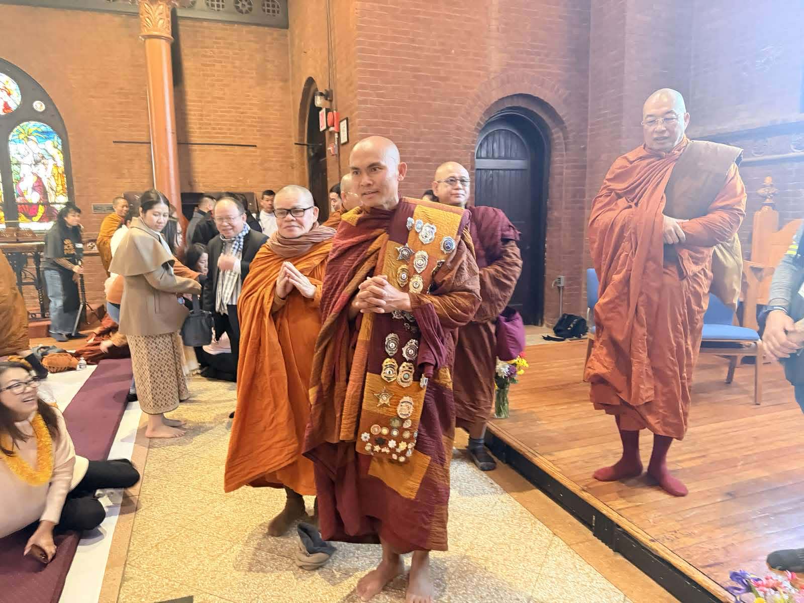 Myanmar Embassy Chargé d'Affaires offers alms to the Walk for Peace Sayadaw