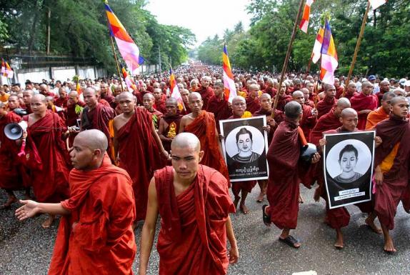 In this file photo taken on September 24, 2007, Buddhist monks march in protest in Yangon, in the strongest show of dissent against the ruling generals in nearly two decades. Myanmar's Buddhist monkhood led an earlier struggle against military rule but were split on the Feb. 1, 2021 coup that ended the country's nascent democracy, with some prominent religious leaders defending the country's new junta. (AFP/-)