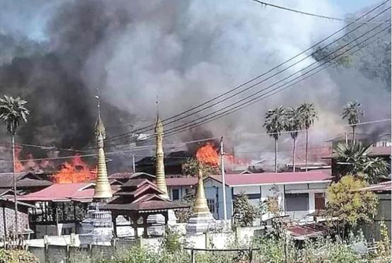 Photo shows some homes burning in Sanphu Village of PaO Self-Administered Zone. 