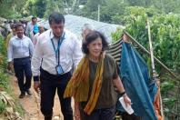 Dr Heyzer (centre) visits a Rohingya refugee camp in Bangladesh in August 2022. PHOTO: AFP