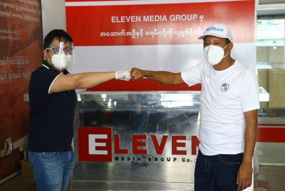 Eleven Media Group's Executive Director Ko Min Thaw Htut (left) and Ayeyarwady Foundation Chairman U Zaw Zaw (right).