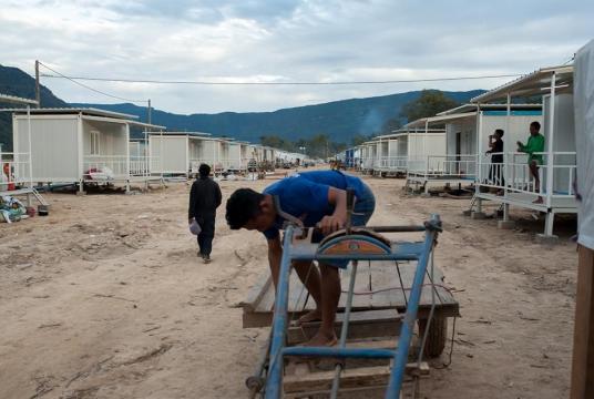 People start to move in Ban Mai temporary residence after part of the residence is finished. These new compact houses will receive displaced villagers from Ban Bok Camp, who currently have to stay in the tents.Photo by Visarut Sankham