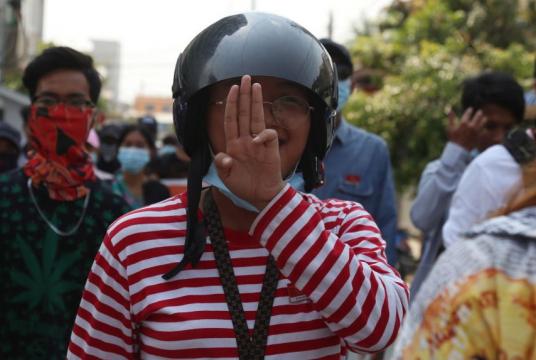 A demonstrator flashes the defiant three-finger salute during an anti-coup protest in Mandalay, Myanmar, on April 9, 2021.PHOTO: EPA-EFE