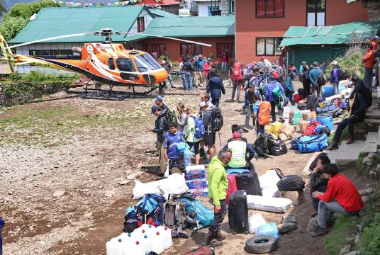 Tourists wait to board a helicopter in Lukla, the gateway to Everest. Post Photo: Manoj Poudel