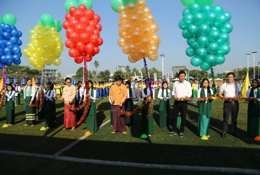 U Zaw Zaw (second right), U Naing Ngan Lin (second left), and Mr. Freddy (first right) cut ribbons to mark the opening ceremony of MFF U-14 100 PLUS Cup 2018. (MFF)
