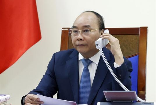Vietnamese Prime Minister Nguyễn Xuân Phúc held a phone call with his Japanese counterpart Shinzo Abe on Tuesday. — VNA/VNS Photo Thống Nhất