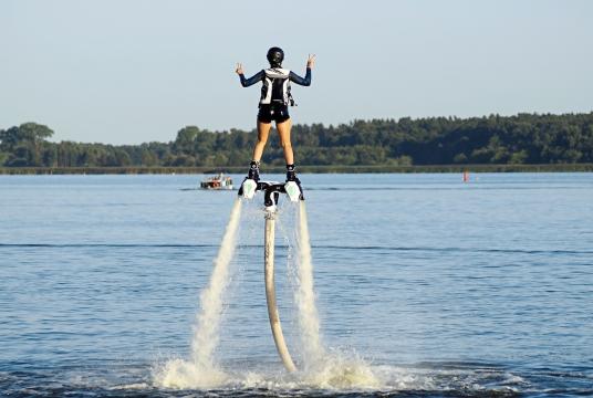 One of the popular sports experiences in Malaysia is flyboarding.