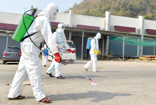 Authorities disinfect the streets in Lashio on March 30th as a preventive measure against COVID-19(Photo-Tun Naing Hlaing)