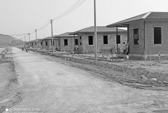 Houses being built for the landslide victims in Paung Township.