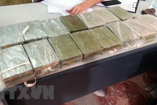 All 30 bricks of heroin found jhidden inside rice sacks and a backpack. — VNA/VNS Photo Mạnh Tú