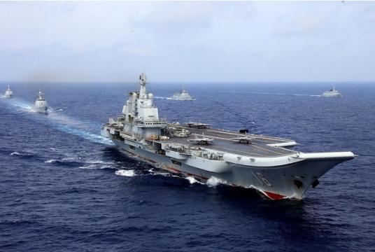 Chinaâ€™s Liaoning aircraft carrier takes part in a Peopleâ€™s Liberation Army Navy military drill in the western Pacific Ocean on April 18, 2018.