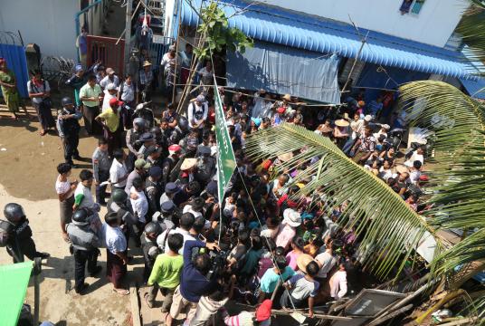 Clash between police, a group wearing blue armbands and squatters took place in Hlaingthayar (Photo-Myo Htet Paing)