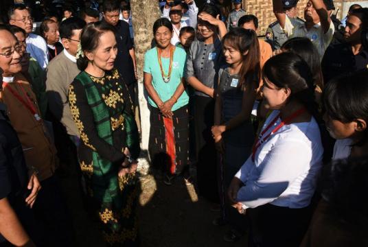 State Counsellor Daw Aung San Suu Kyi meeting with people at Ingyandon Baptist IDP camp in Thatkon Ward in Myitkyina yesterday. Photo:MNA