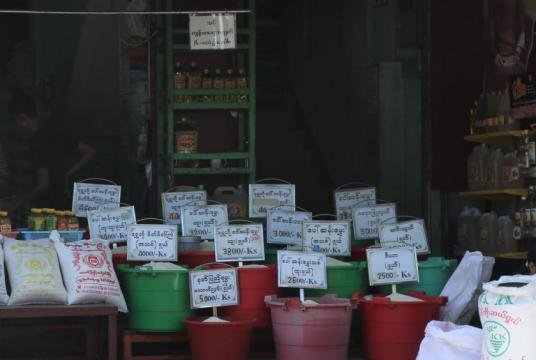 Photo shows different kinds of rice with different prices for sale at a market in a township of Yangon city. (Photo-Thiha Aung)