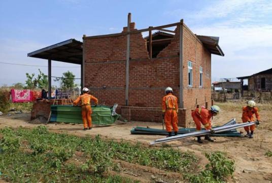 Roofs of houses blown off due to strong winds in Nay Pyi Taw on February 21.