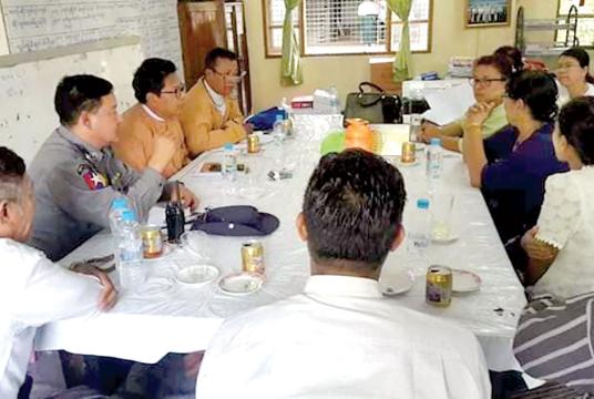 MP Nyi Nyi discuss the seizure of devices for methamphetamine consumption with authorities.