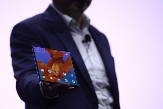 Richard Yu, the CEO of Huawei's consumer products division presents the new HUAWEI Mate X foldable smartphone at the Mobile World Congress (MWC), on the eve of the world's biggest mobile fair, on February 24, 2019 in Barcelona. (AFP/Josep Lago)
