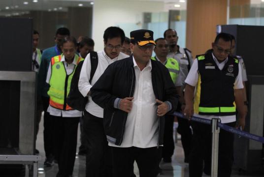 Transportation Minister Budi Karya Sumadi (center) walks at Kertajati International Airport in Majalengka, West Java, on March 1. The minister tested positive of COVID-19, State Secretary Pratikno announced on Saturday evening. (Antara/Dedhez Anggara)