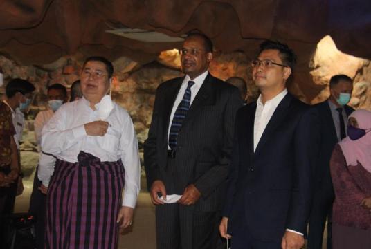 Khin Shwe is seen escorting visitors to the Zaykabar Museum