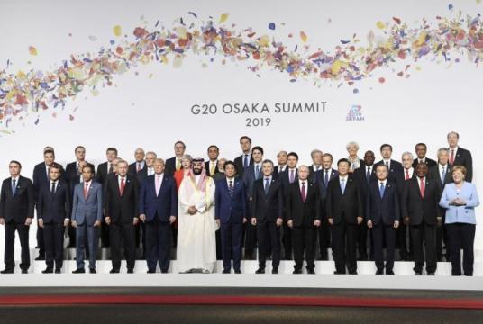 State leaders pose for group photograph on June 28, the last day of the 2019 Group of 20 Summit held in Osaka, Japan. (Yonhap)