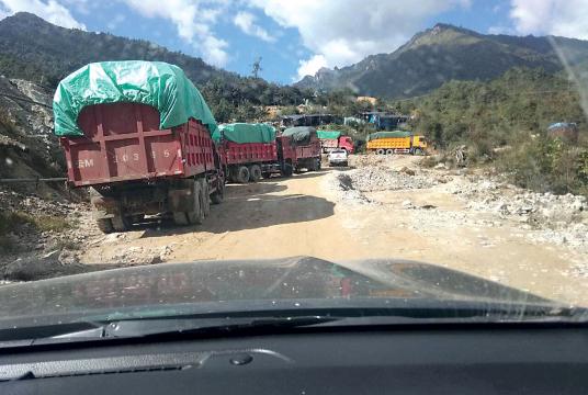 A convoy of trucks loaded with Ammonium Sulphate.(Photo-Mines Department in Kachin State)