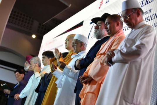 President Halimah Yacob thanked religious and community leaders for their efforts in keeping society together.PHOTO: ST FILE