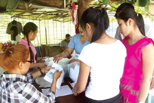 Letwar Garment Factory in Hlaingthaya Industrial Zone paid compensations to workers on 11th March (Photo-Shine Lin Aung)