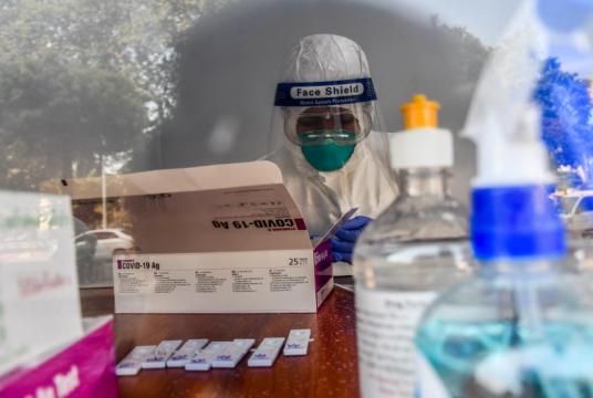 A medical staff is seen at the laboratory (Photo-Kyi Naing)