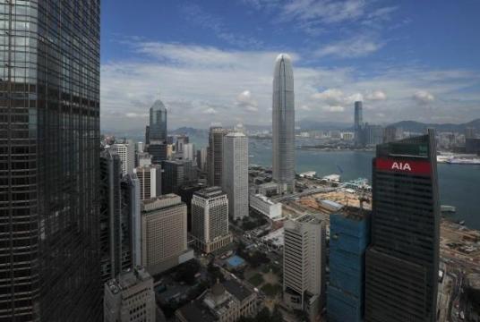 In this Nov 4, 2011 photo, office blocks, including the International Finance Center, center, are seen in Hong Kong. (AARON TAM / AFP)