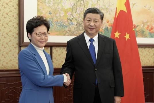 President Xi Jinping meets on Dec 16, 2019 with Chief Executive of the Hong Kong Special Administrative Region Carrie Lam Cheng Yuet-ngor, who is visiting Beijing to deliver her annual work report to the president. (LI XUEREN / XINHUA)