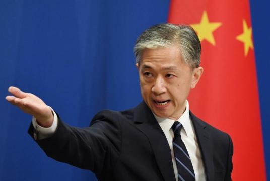 Chinese Foreign Ministry spokesman Wang Wenbin takes a question during the daily Foreign Ministry briefing in Beijing on July 24, 2020. (GREG BAKER / AFP)