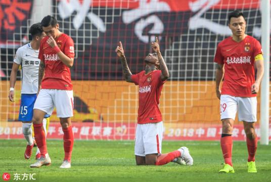 Brazilian football player Anderson Talisca or simply Talisca of Guangzhou Evergrande Taobao celebrates after scoring against Tianjin TEDA in their 30th round match during the 2018 Chinese Football Association Super League (CSL) in Guangzhou city, South China's Guangdong province, Nov 11, 2018. [Photo/IC] 