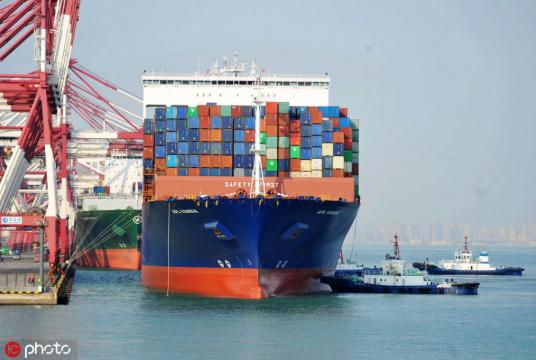 A US container ship is docked at a port in Qingdao, East China's Shandong province, on April 1, 2019. [Photo/IC]