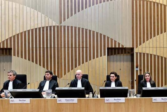 Judges attend the criminal trial against four suspects in the July 2014 downing of Malaysia Airlines flight MH17, in Badhoevedorp, Netherlands, yesterday.