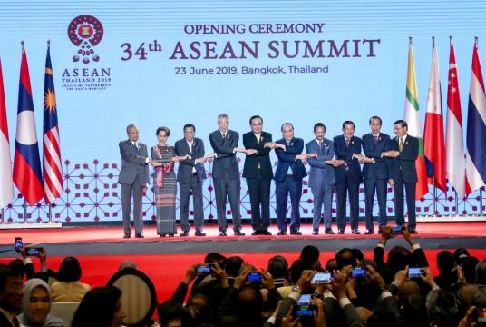 Asean leaders link hands at the opening ceremony of the summit in Bangkok.