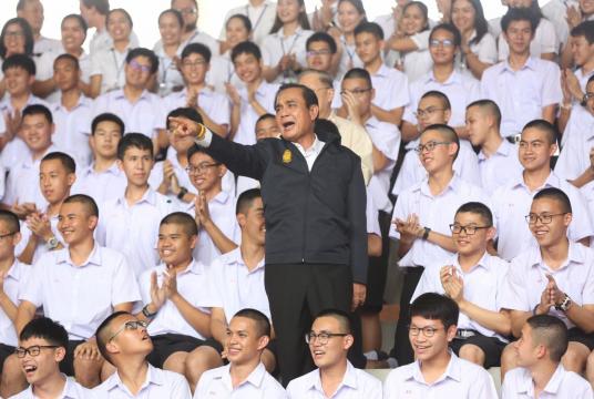 Prime Minister General Prayut Chan-o-cha addresses students of Kamnoetvidya Science Academy in Rayong province during a visit yesterday./The Nation