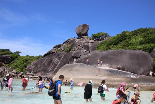 Tourists splash in the clear blue sea at Mu Ko Similan National Park in this Nation file photo.
