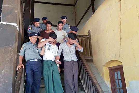 The suspects appear in court.