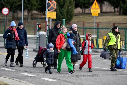 Refugees from Ukraine at the Polish-Ukrainian border crossing in Korczowa, Poland, on March 10, 2022. PHOTO: EPA-EFE