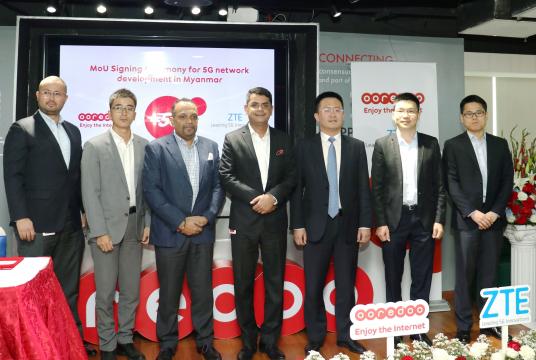 Alok Verma, acting chief executive of Ooredoo Myanmar (middle), joins a group photo session after the MoU signing with ZTE Corporation (Photo Courtesy of Ooredoo Myanmar)
