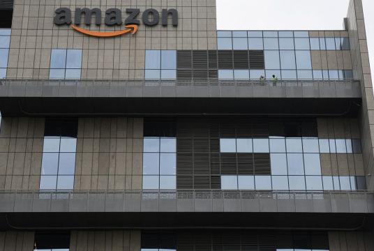 In 2020, Amazon India had announced that its fleet of delivery vehicles will include 10,000 electric vehicles (EVs) by 2025 in India. (Photo: AFP) 