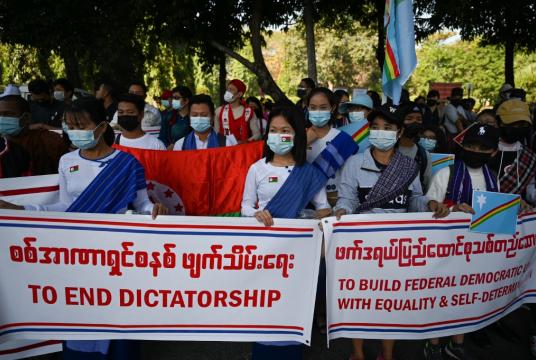 Representatives from Karen ethnic group take part in a demonstration against the military coup in Yangon on February 11, 2021. (AFP/Ye Aung Thu)