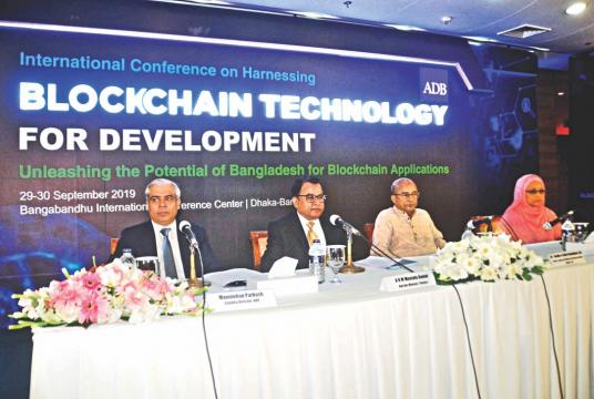Finance Minister AHM Mustafa Kamal speaks at an international conference on blockchain technology at Bangabandhu International Conference Center in Dhaka yesterday. Photo: Collected