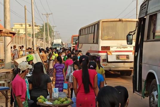 Workers heading to their factories in the Bago Industrial Zone.