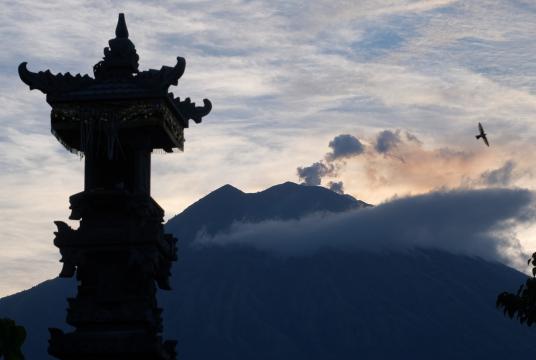 Mount Agung spews volcanic ashes as seen from Tulamben village in Karangasem regency in Bali on Feb. 22. Nation/Jakarta Post
