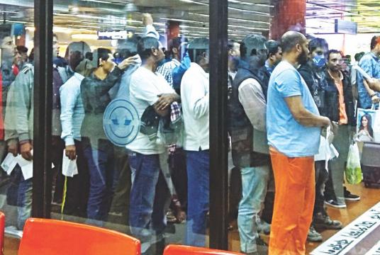 Saudi Arabia deports 86 Bangladeshi workers. Police are making a list of them at Hazrat Shahjalal International Airport. Photo: Anisur Rahman
