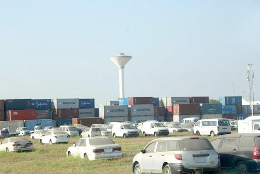 Caption: Vehicles imported are seen at the Thilawar Port
