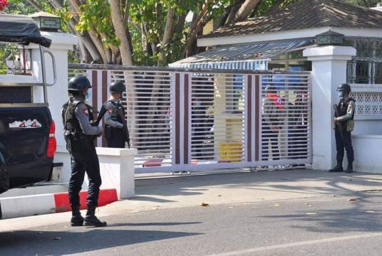 Security guards stand by in front of the house of Dr Zaw Myint Maung. (Photo-Htay Hla Aung) 