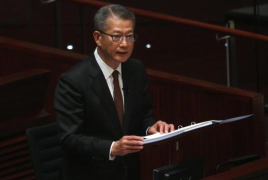 Hong Kong's Financial Secretary Paul Chan Mo-po delivers the 2020 budget speech at the Legislative Council in Hong Kong, Feb 26, 2020. (PARKER ZHENG / CHINA DAILY)